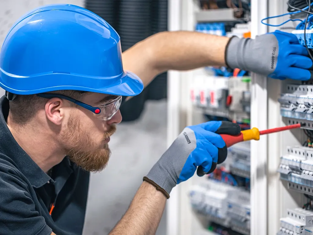 Electrician working on an electrical panel in Durham, NC